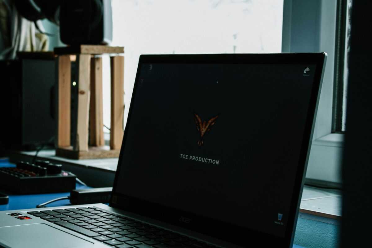 a laptop computer sitting on top of a desk