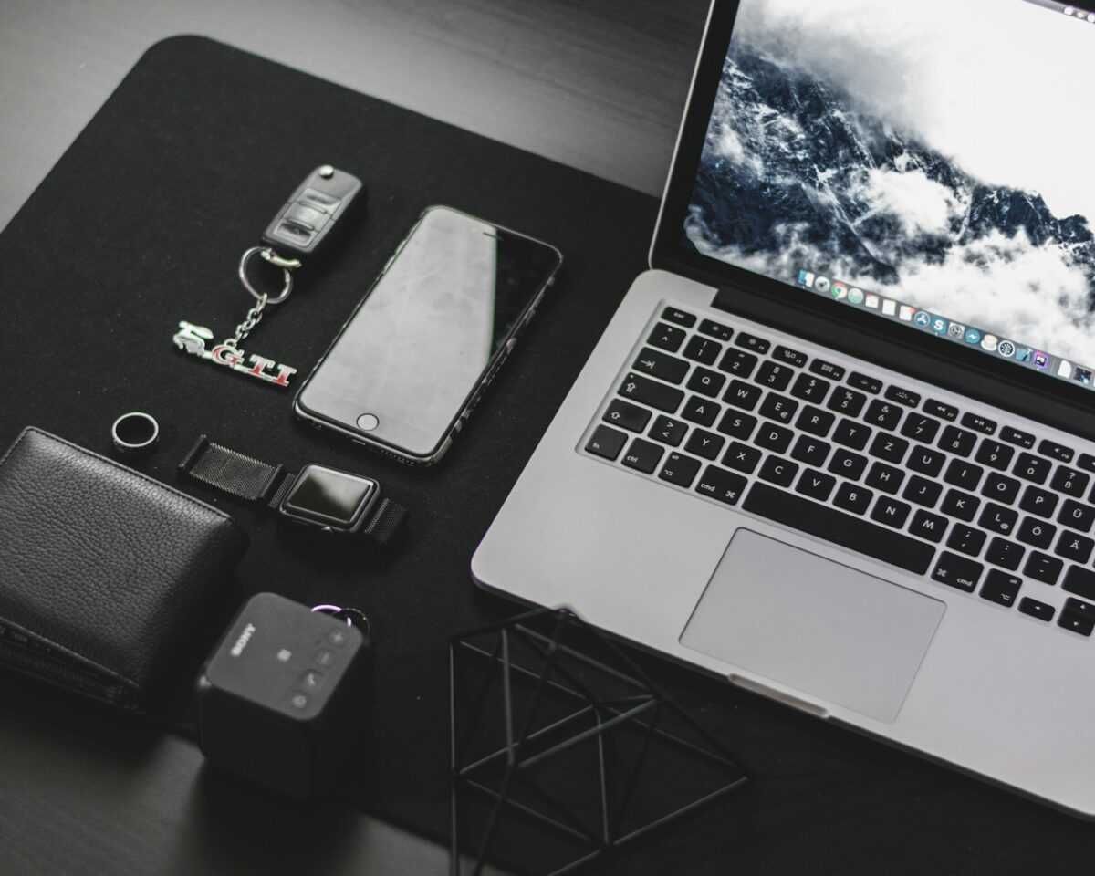 MacBook Pro on top of desk